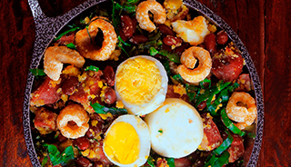 FEIJÃO TROPEIRO (pinto beans, sausage, bacon, pork belly, eggs, collard greens and yucca crumbs)